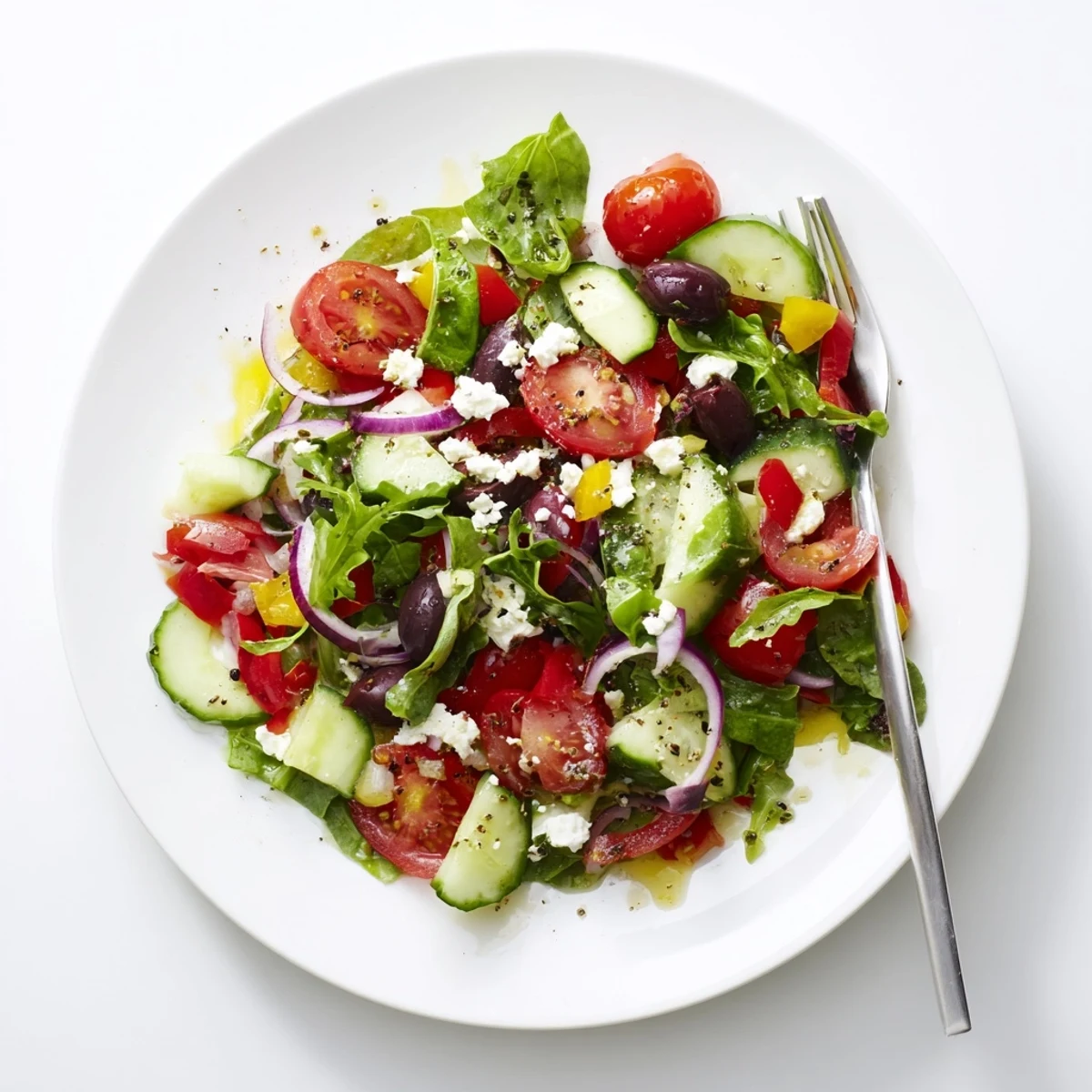 Bright Fresh Salad Recipe bursting with cherry tomatoes, crisp cucumbers, lemony dressing.